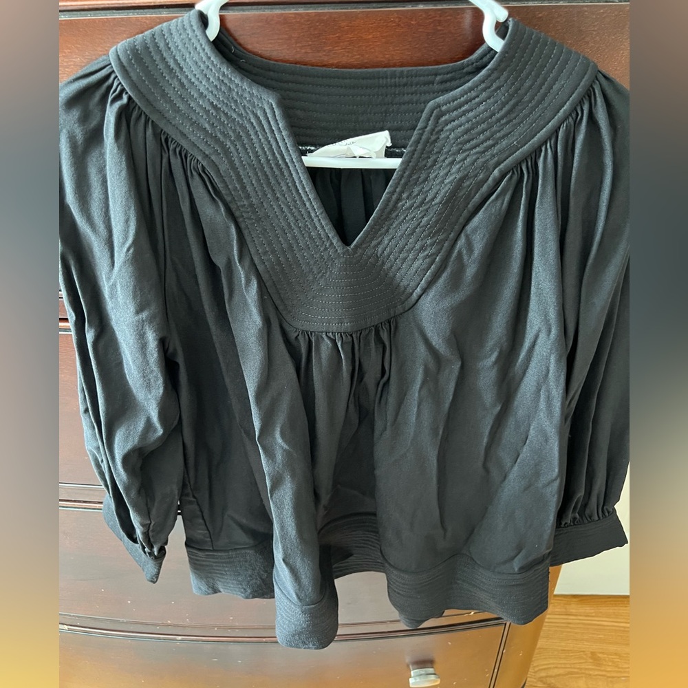 Pomander place black top